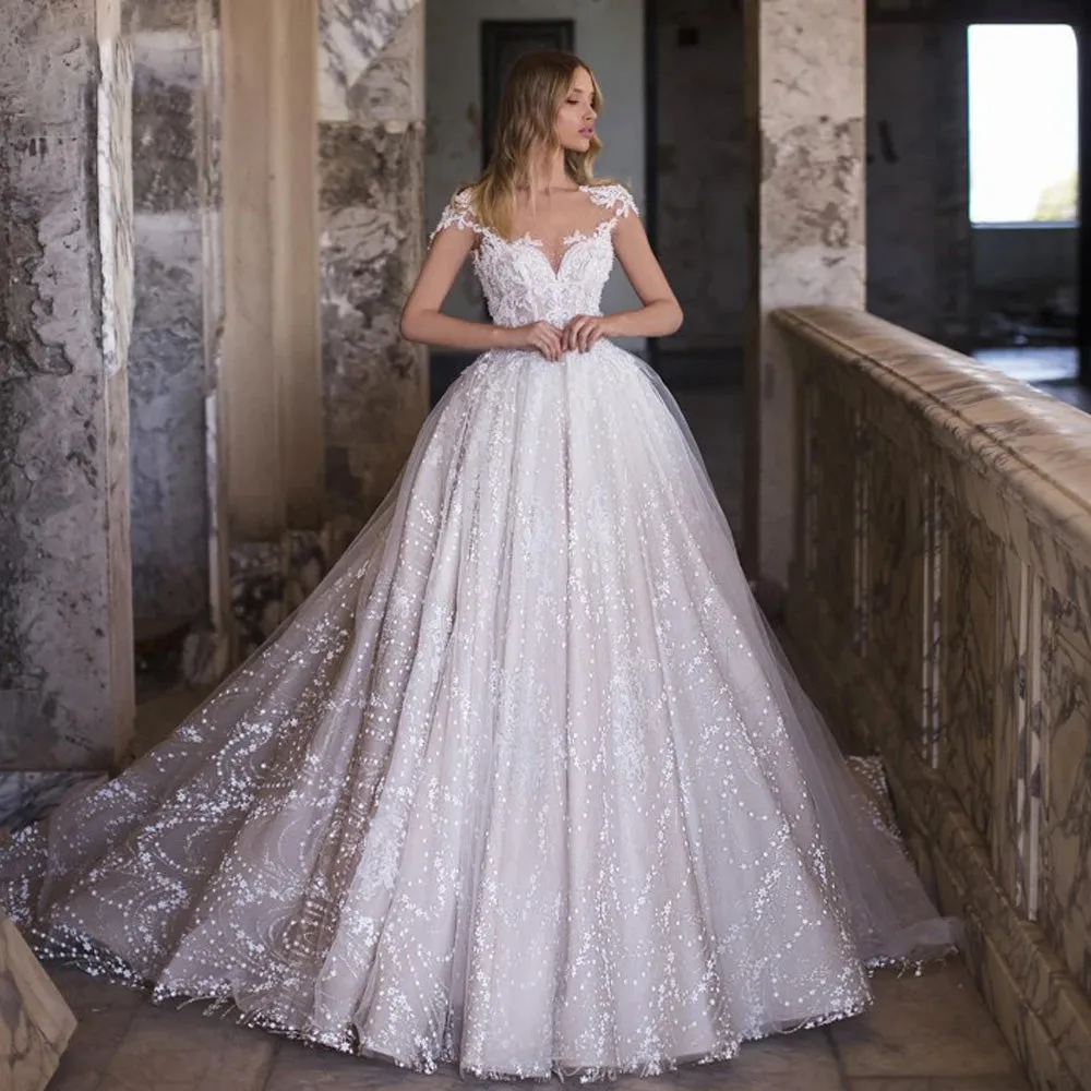 Exquisite Sexy Backless Lace Princess Wedding Dress Luxury Cap Sleeve Appliques Beaded Vintage Bridal Gown
