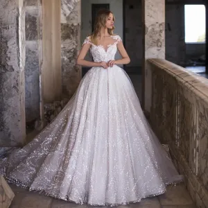 Exquisite Sexy Backless Lace Princess Wedding Dress Luxury Cap Sleeve Appliques Beaded Vintage Bridal Gown